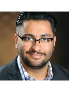Hesam Amiralaei - RE/MAX Masters Realty