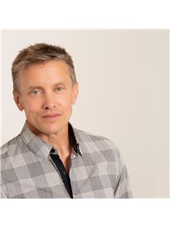 John E. Kristian - RE/MAX Vernon