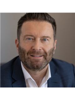 Artur Kominek - RE/MAX River City