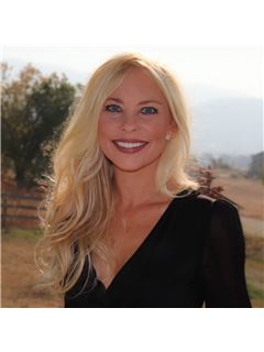 Meagan Bucar - RE/MAX Vernon