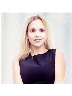 Laura DeNobriga - RE/MAX Treeland Realty