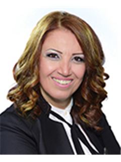 Berra Tarraf - RE/MAX 2001