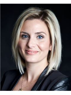Michela Iacovella - RE/MAX 2001