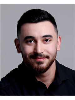 Osama Iskandar - RE/MAX 2001