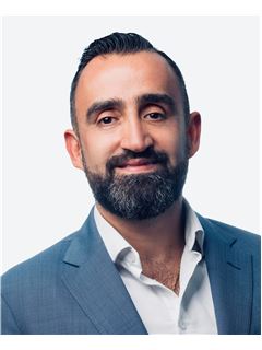 Georges Aho - RE/MAX 2001