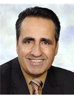 Jean Karam - RE/MAX 2001