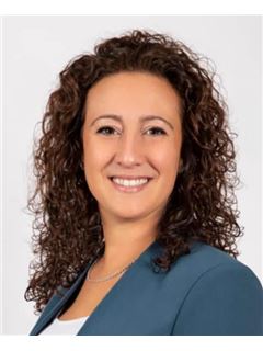 Luciana Gargiso - RE/MAX 2000