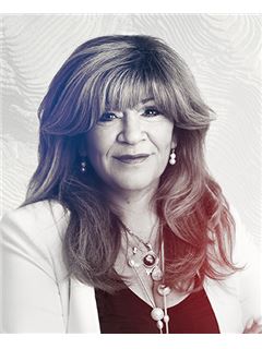 Carmen Deligia - RE/MAX 2000
