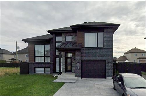 Residential - Two Level House - Sainte-Marthe-sur-le-Lac, Canada - Canada