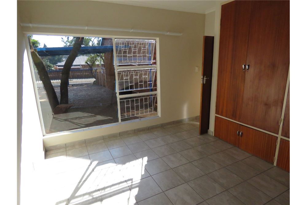 Residencial - Casa - Karenpark, Gauteng - South Africa - 31 - 1031414013-120