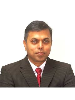 Rahul Pujari - RE/MAX Metropolis Realty