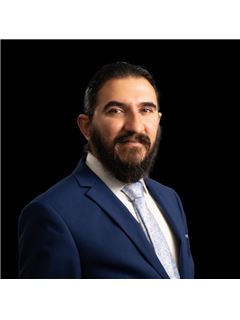 Maan Al Aidani - RE/MAX Twin City Realty Inc
