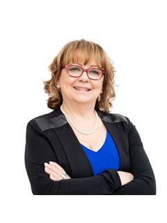 Ingrid S Smith - RE/MAX West Realty Inc