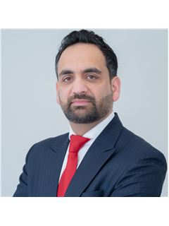 Anshu Sharda - RE/MAX Realty Services Inc