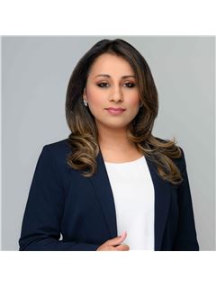 Mona Singh - RE/MAX Realty Services Inc