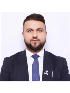 Mushtaba Hussiany - RE/MAX Metropolis Realty
