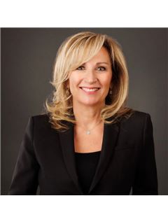 Debbie Bull - RE/MAX Realty Specialists Inc