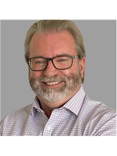 Edward Tracy - RE/MAX Hallmark Chay Realty
