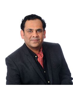 Sanie A. Lodi - RE/MAX Realty Specialists Inc