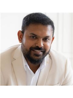 Praveen Raj Ganesan - RE/MAX Community Realty Inc.
