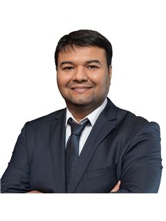 Hardik Adhvaryu - RE/MAX Metropolis Realty