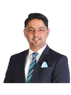 Raman Johal - RE/MAX Realty Services Inc