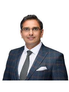 Ravi Baghla - RE/MAX Realty Services Inc