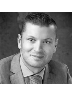 Brady Buck - RE/MAX Real Estate Centre Inc