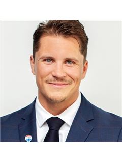 Cole Burke - RE/MAX Hallmark Chay Realty