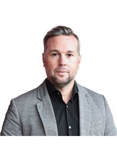 Adam Smith - RE/MAX Hallmark Chay Realty