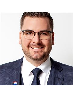 Alex Quesnel - RE/MAX Hallmark Chay Realty