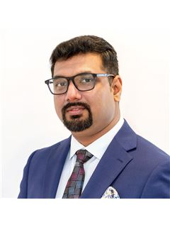 Jijo Varughese - RE/MAX Realty Services Inc