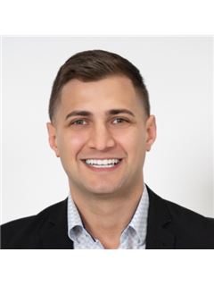 Dylan Tackoor - RE/MAX Hallmark First Group Realty Ltd