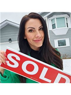 Linda Ann McTavish - RE/MAX Hallmark Chay Realty