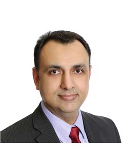 Harmel Johal - RE/MAX Paramount Realty Brokerage