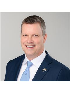 Bruce E. Bell - RE/MAX Realty Services Inc