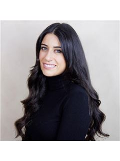 Marie Canonaco - RE/MAX West Realty Inc