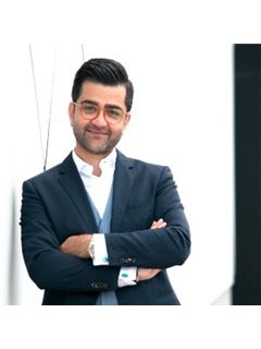 Kam Lolavar Tehrani - RE/MAX Hallmark Realty Ltd