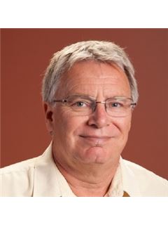 Nigel Davies - RE/MAX Hallmark Chay Realty