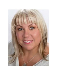 Tami Genge - RE/MAX Hallmark Realty Ltd
