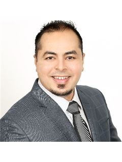 Krizal Adhikari - RE/MAX Real Estate Centre Inc