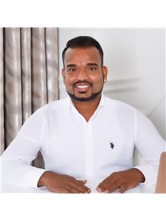 Karan Kanagasabai - RE/MAX Community Realty Inc.