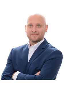 Justin Cannon - RE/MAX Escarpment Realty, Inc.