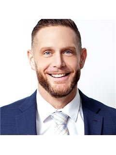 Ryan Staveley - RE/MAX Hallmark Chay Realty