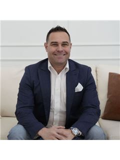 Tim Fennessey - RE/MAX Hallmark First Group Realty Ltd