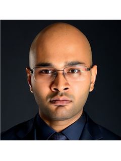 Joshua Khan - RE/MAX Twin City Realty Inc
