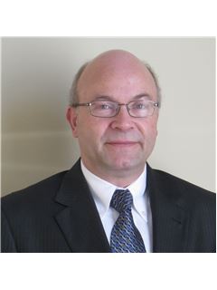 William J. Halley - RE/MAX Realty Specialists