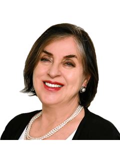 Bonnie Lee Hutchins, FRI - RE/MAX Nova