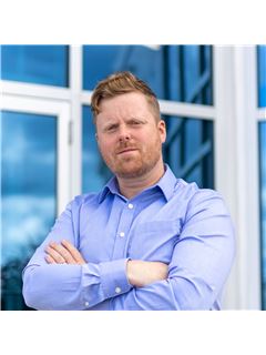 T. Chandler Haliburton - RE/MAX Nova