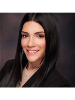 Sandy Robles - RE/MAX Heritage
